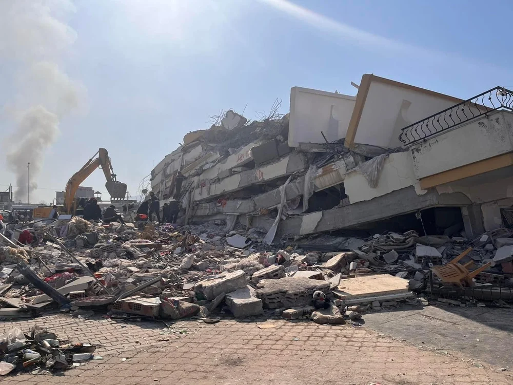 Earthquake-damaged buildings with response activity nearby